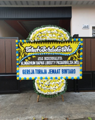Papan Bunga Duka di Binjai Estate